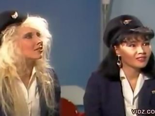 Three fabulous flight stewardess in one scene